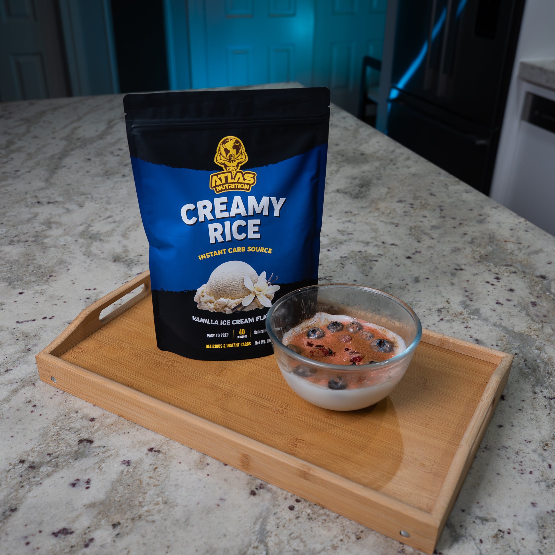Atlas Nutrition Vanilla Ice Cream Cream of Rice served with blueberries and raspberry — healthy carb meal idea