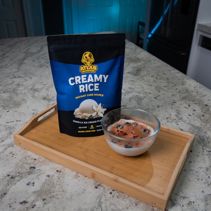 Atlas Nutrition Vanilla Ice Cream Cream of Rice served with blueberries and raspberry — healthy carb meal idea
