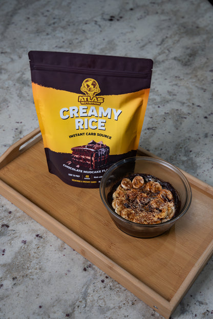 Atlas Nutrition Chocolate Mudcake Cream of Rice — prepared bowl with banana topping